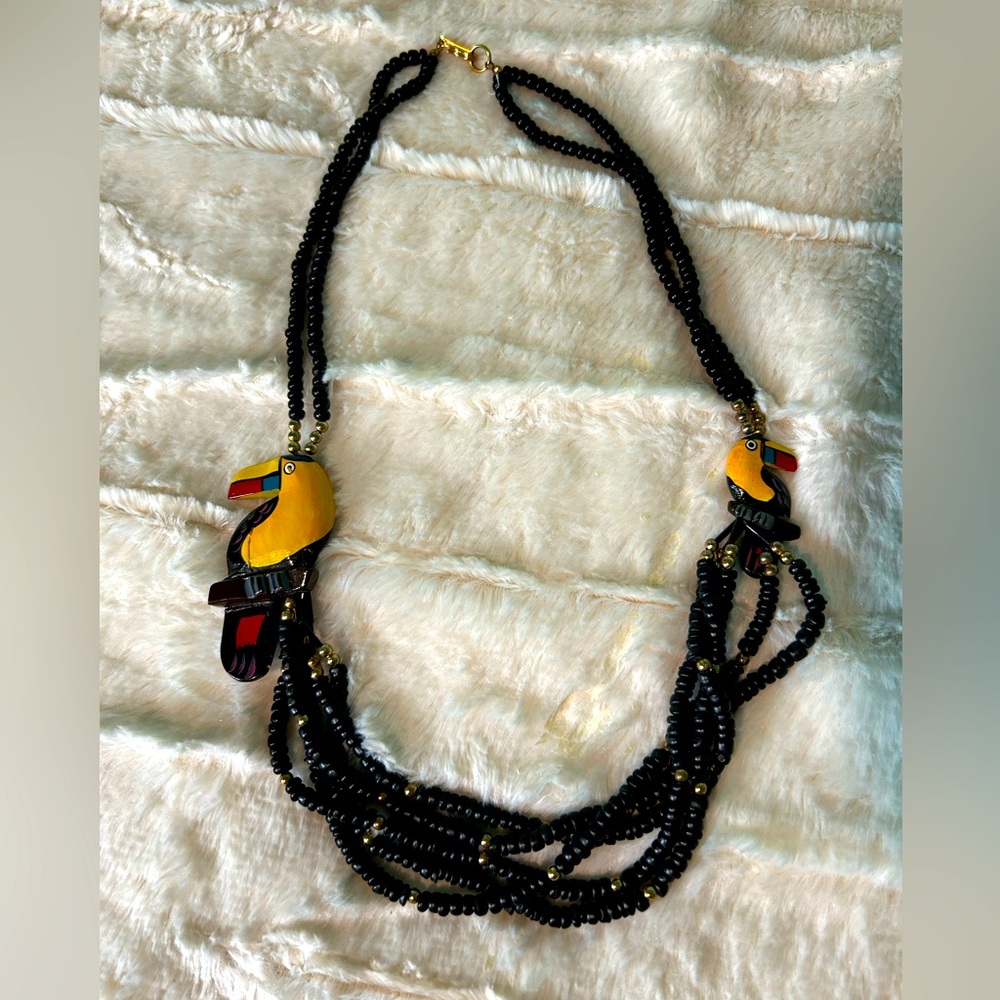Vintage wooden beads and handpainted bird necklace ..hook clasp